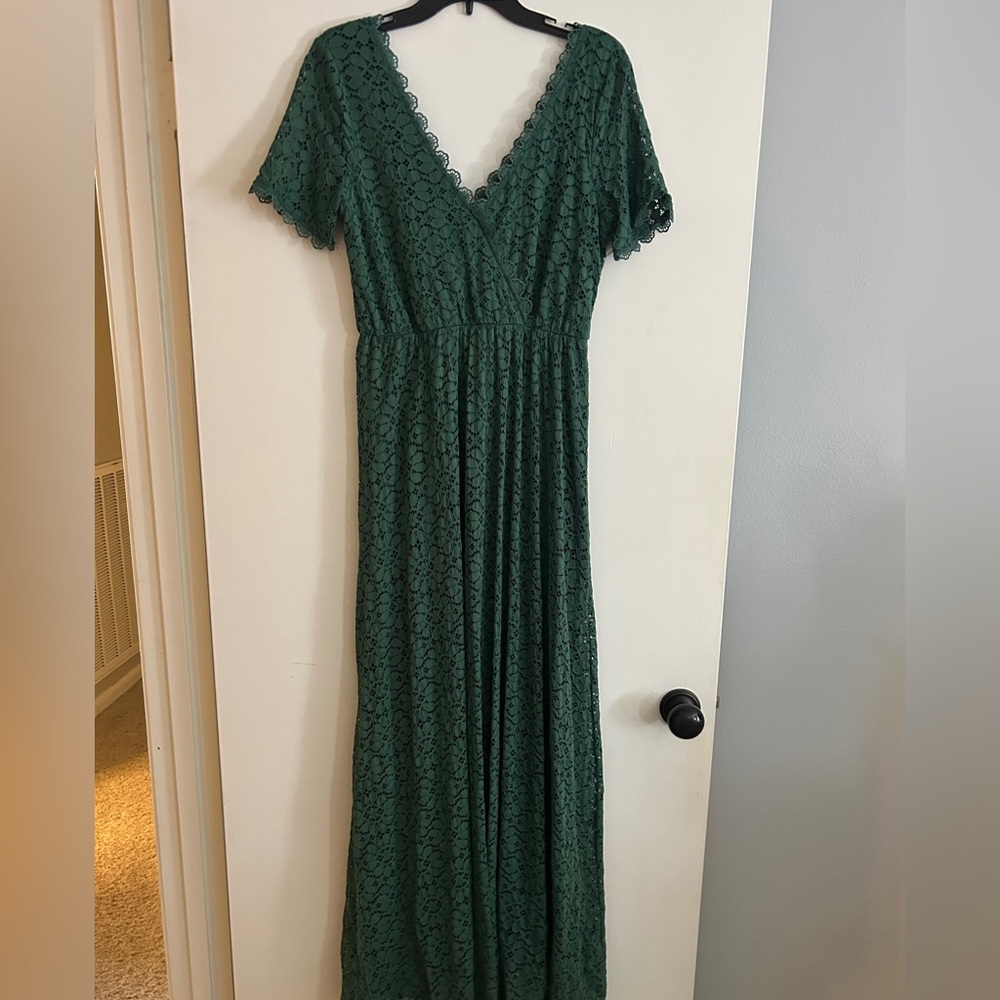 Green lace maxi dress with double V neckline. Size Large from Baltic Born